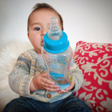 Agua purificada remineralizada para bebes y niños en mamaderas biberón producida con Energía Solar
